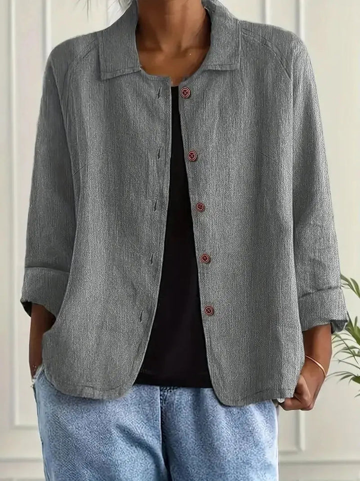 Women's button-front lightweight linen blazer, perfect for layering & adding tailored style to any outfit.