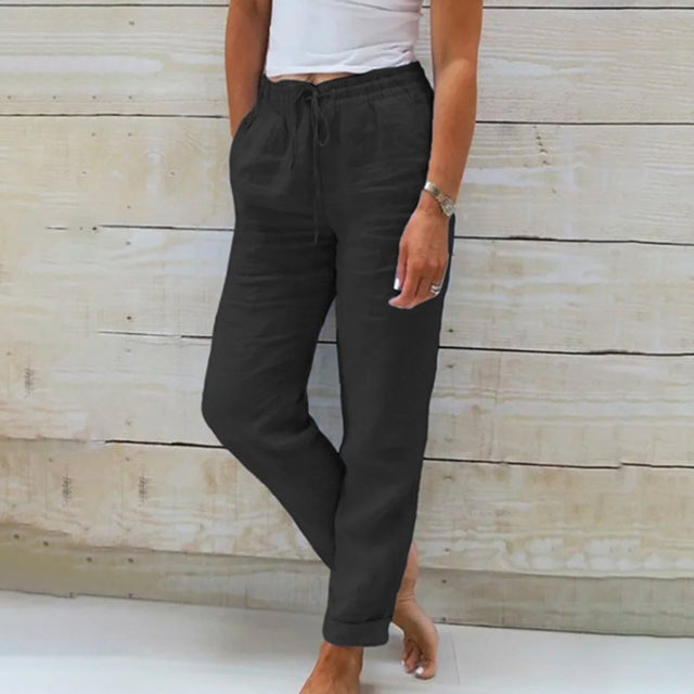 Stylish women's linen pants with comfortable drawstring waist, ideal for summer.
