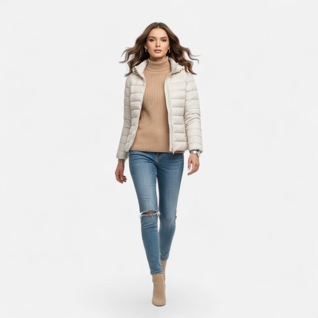 This plus-size women's hooded coat offers lightweight warmth and style.