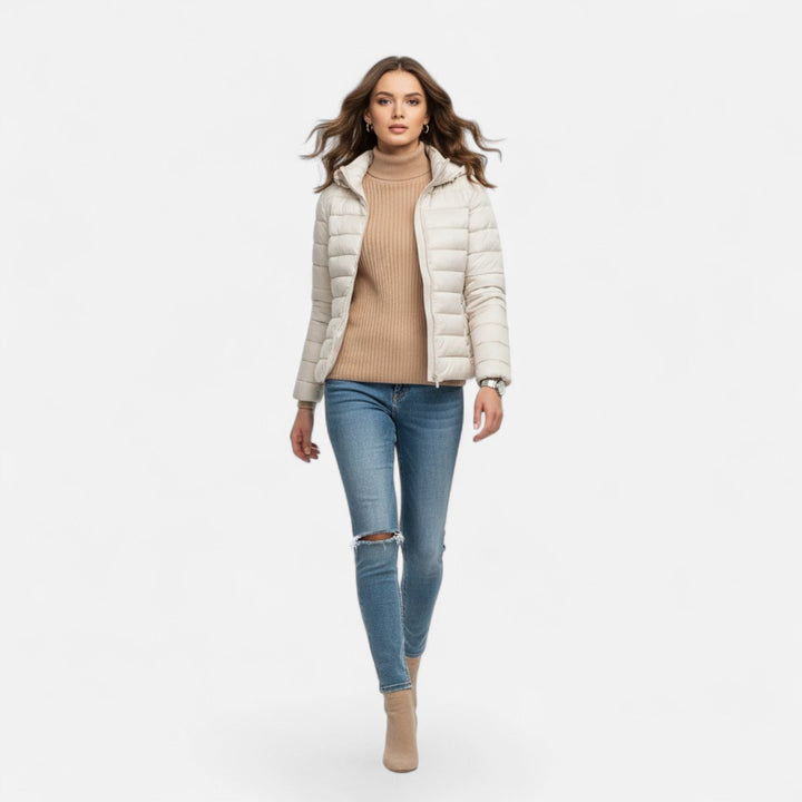 This plus-size women's hooded coat offers lightweight warmth and style.