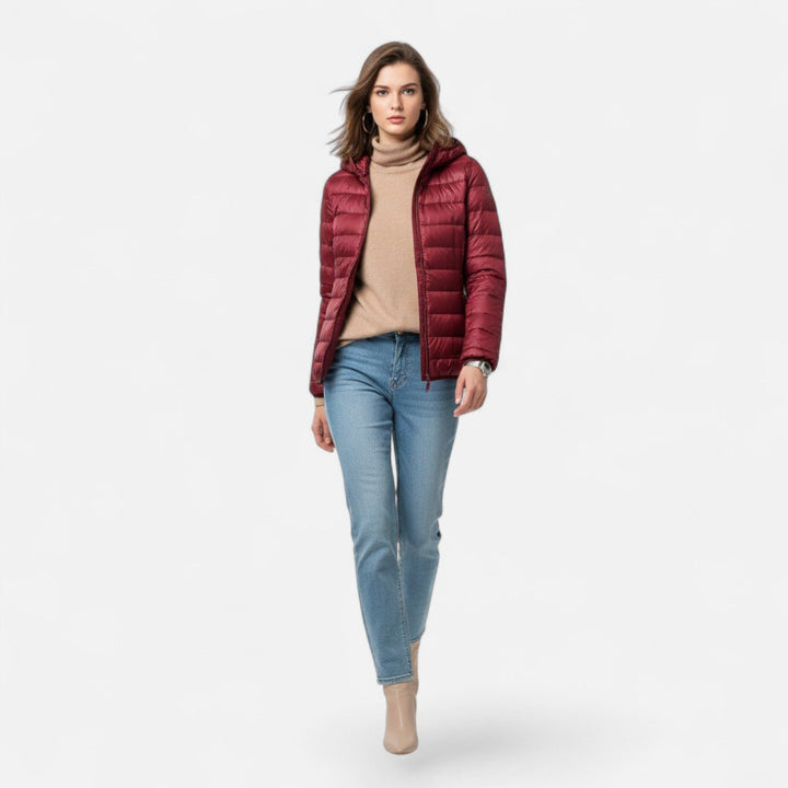 Perfect for cold days: a plus-size women's lightweight hooded down coat.