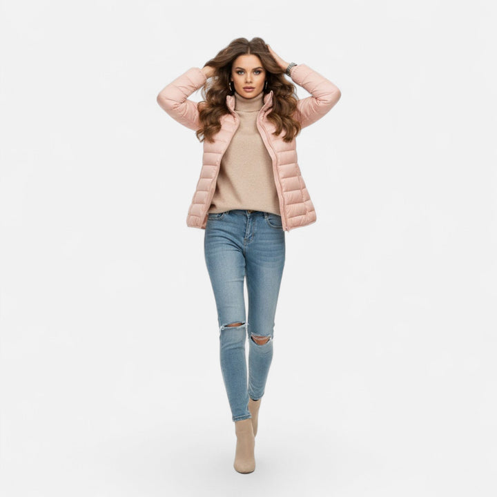 Stay warm in this lightweight plus-size women's down winter jacket.