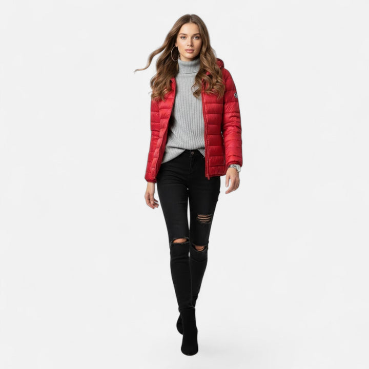 Plus-size women's cold weather gear: a comfortable down-filled coat.