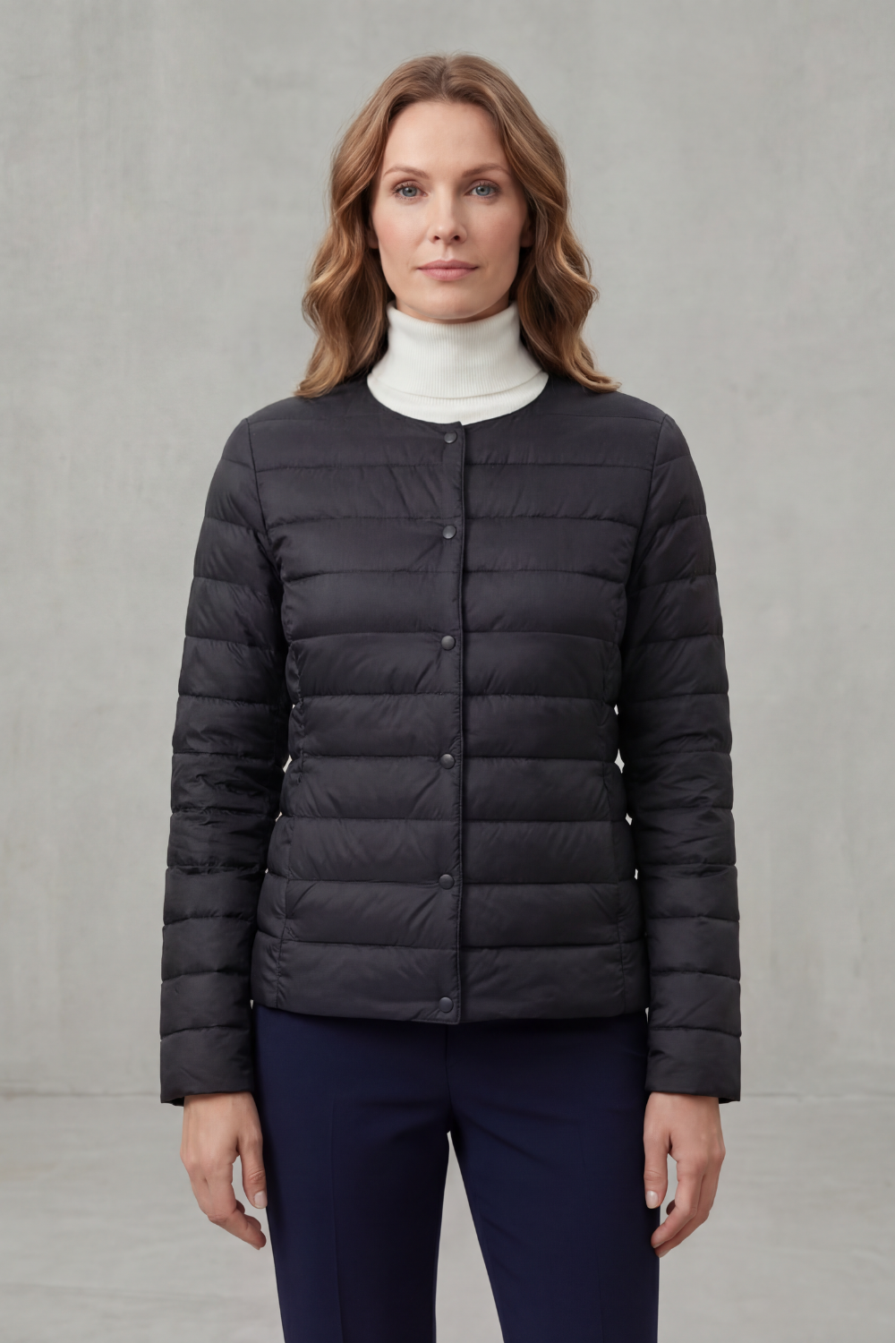 Black women's lightweight puffer jacket, sleek & warm for fall/winter style.