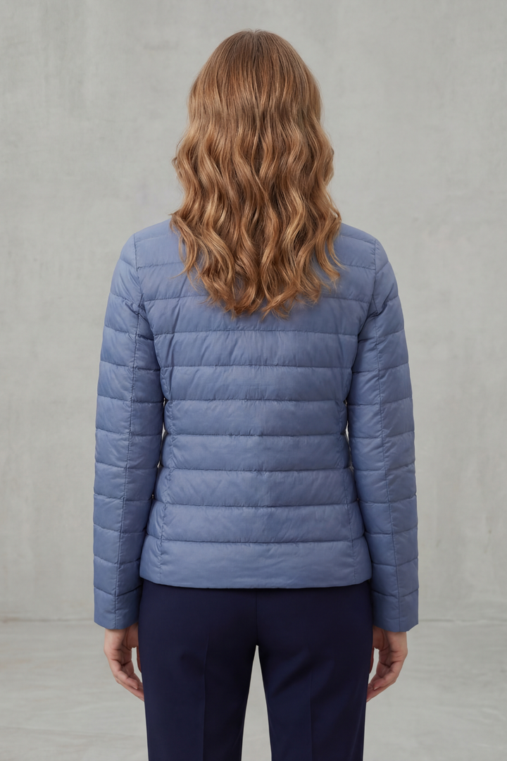 Fashionable women's lightweight puffer jacket, chic outerwear for everyday style.
