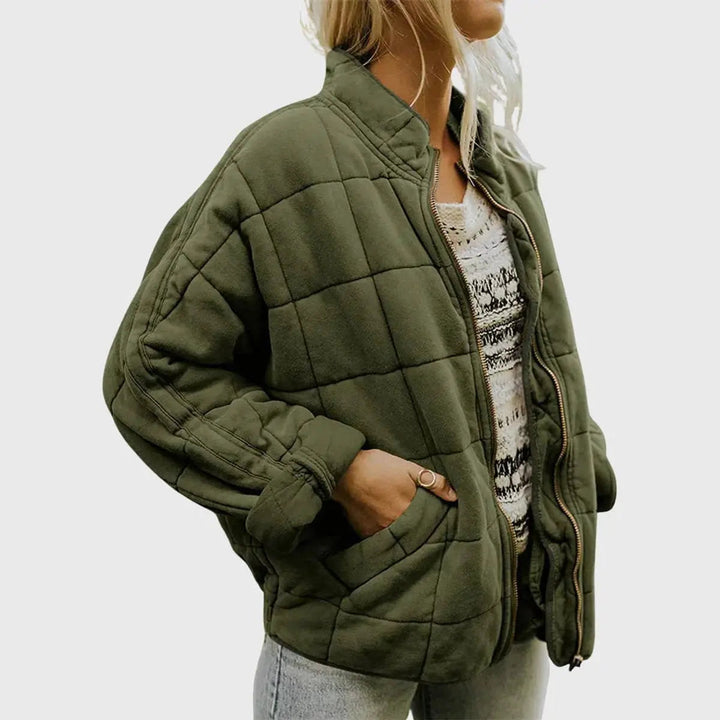 Women's lightweight quilted jacket with stand collar. Perfect for casual autumn wear.