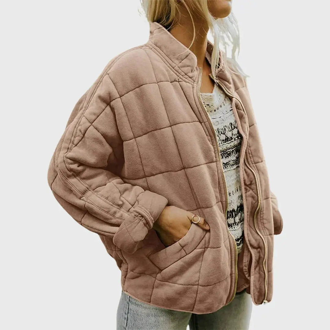 Versatile women's padded coat, lightweight & perfect for layering. Features a comfy stand collar.