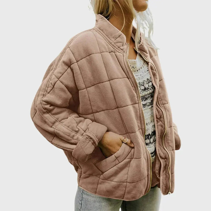 Versatile women's padded coat, lightweight & perfect for layering. Features a comfy stand collar.