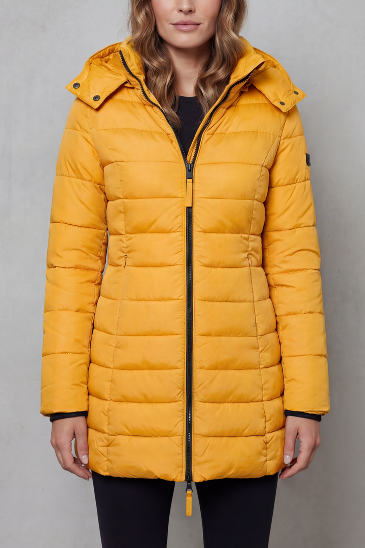 Women's warm quilted puffer jacket, a lightweight and fashionable outerwear choice for cold days.