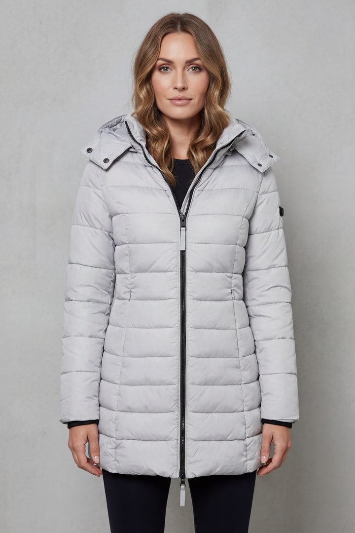 Stylish women's puffer jacket, quilted design, offering lightweight warmth for fall and winter.