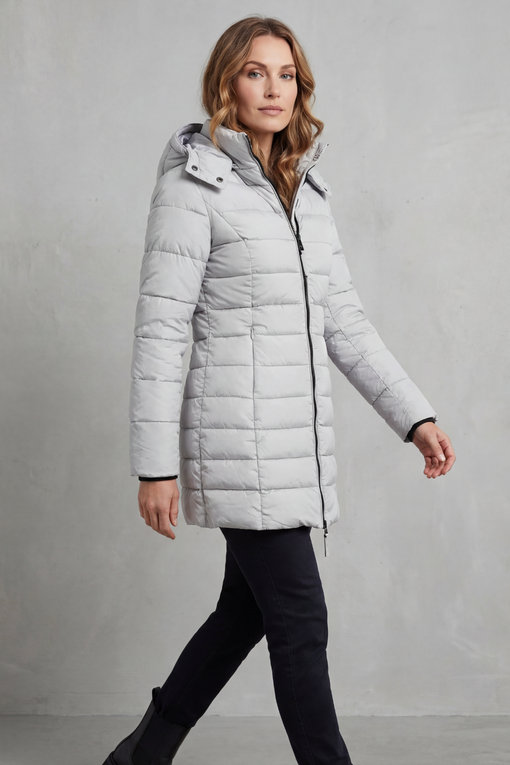 Cozy women's quilted puffer coat, ideal everyday outerwear, providing warmth for cold weather.