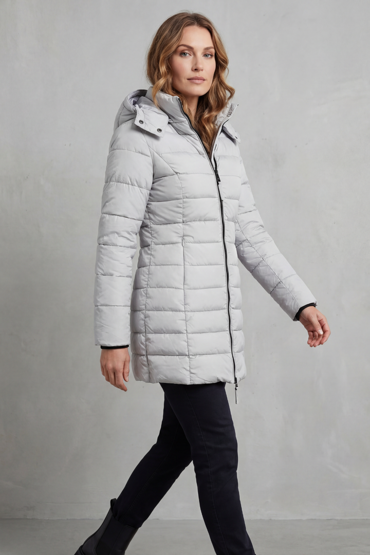 Cozy women's quilted puffer coat, ideal everyday outerwear, providing warmth for cold weather.