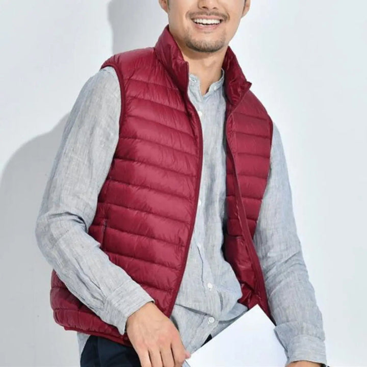 Women's lightweight quilted puffer vest, zip-up, perfect for layering transitional outfits. Sleeveless gilet.