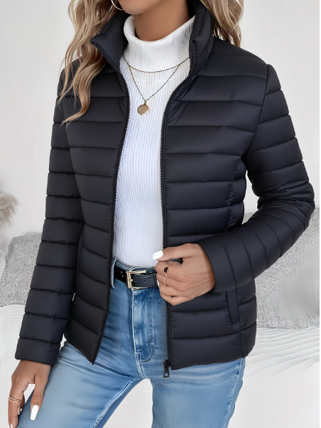 Chic women's lightweight quilted spring jacket, ideal transitional outerwear for versatile fashion.