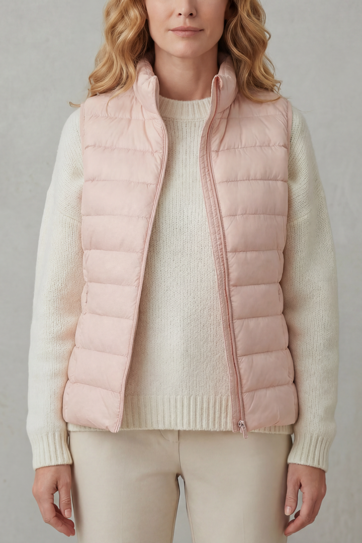 Lightweight women's vest, quilted for a subtle texture & chic appeal.