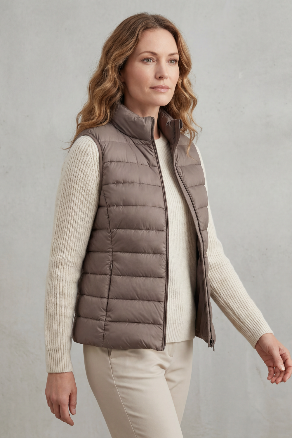 Casual women's sleeveless jacket, quilted for seasonal warmth.
