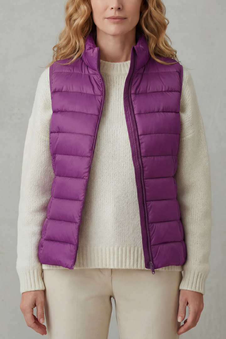 Sleek women's quilted layering vest, perfect for a stylish casual look.