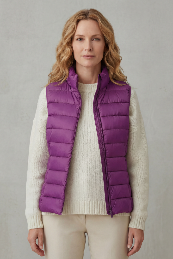 Lightweight women's vest, quilted for comfort and seasonal versatility.