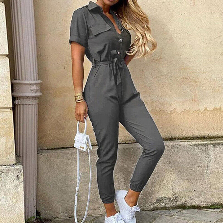 Trendy women's short sleeve jumpsuit, featuring a comfortable, structured fit & stylish button detail.