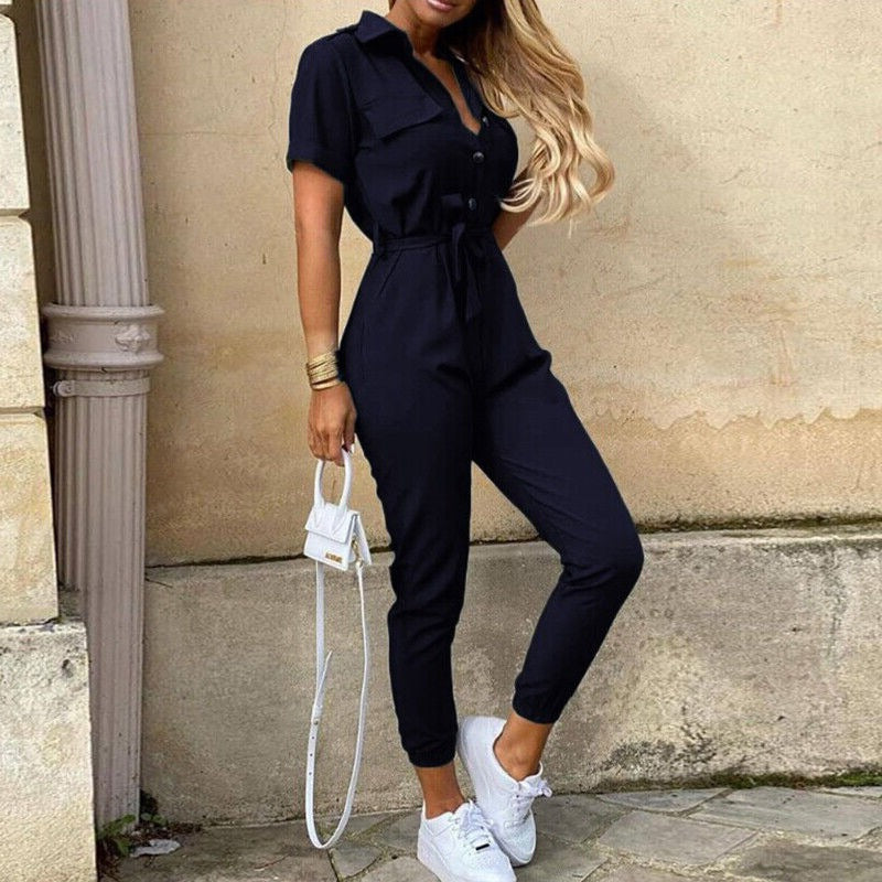 Women's button-closure jumpsuit in a lightweight fabric, styled for casual or semi-formal occasions.