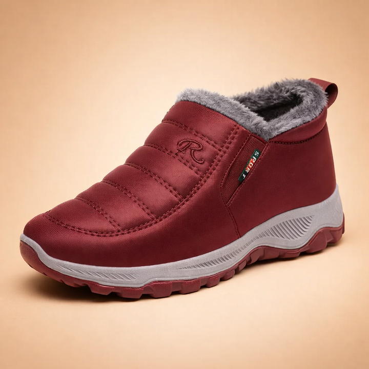 Women's lightweight slip-on winter boots in black, offering effortless warmth and style.