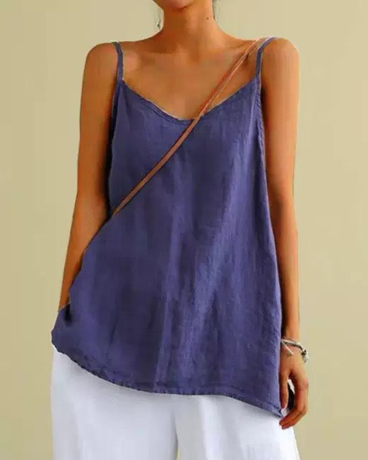Stylish women's summer top with thin spaghetti straps, offering a breathable feel.