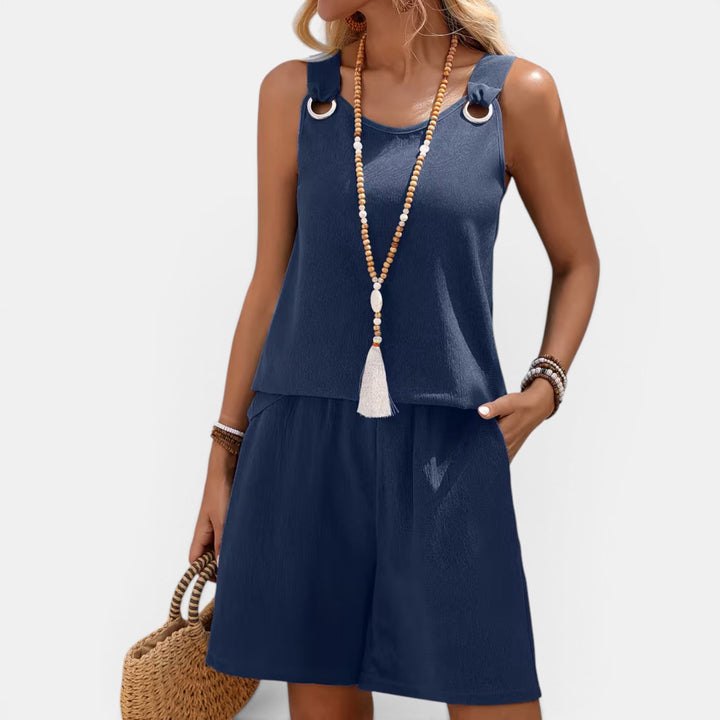 Chic coastal style two-piece set for women, casual summer outfit with sleeveless top.