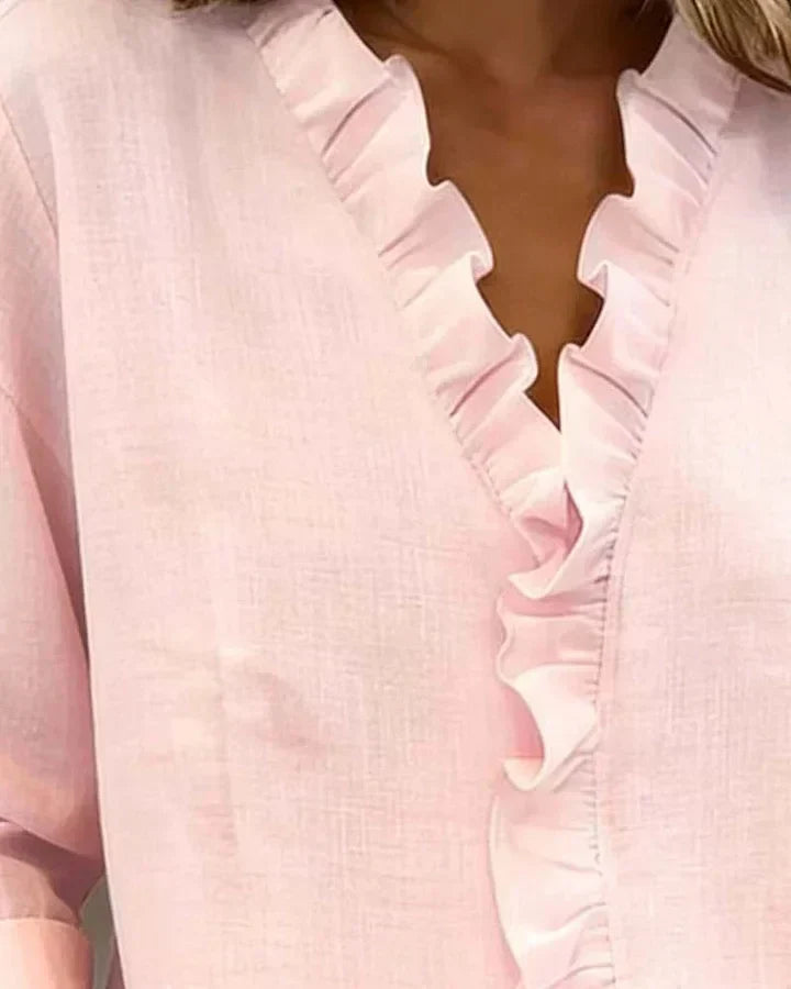 Feminine V-neck ruffled blouse, a comfortable long sleeve top for women, perfect for office.