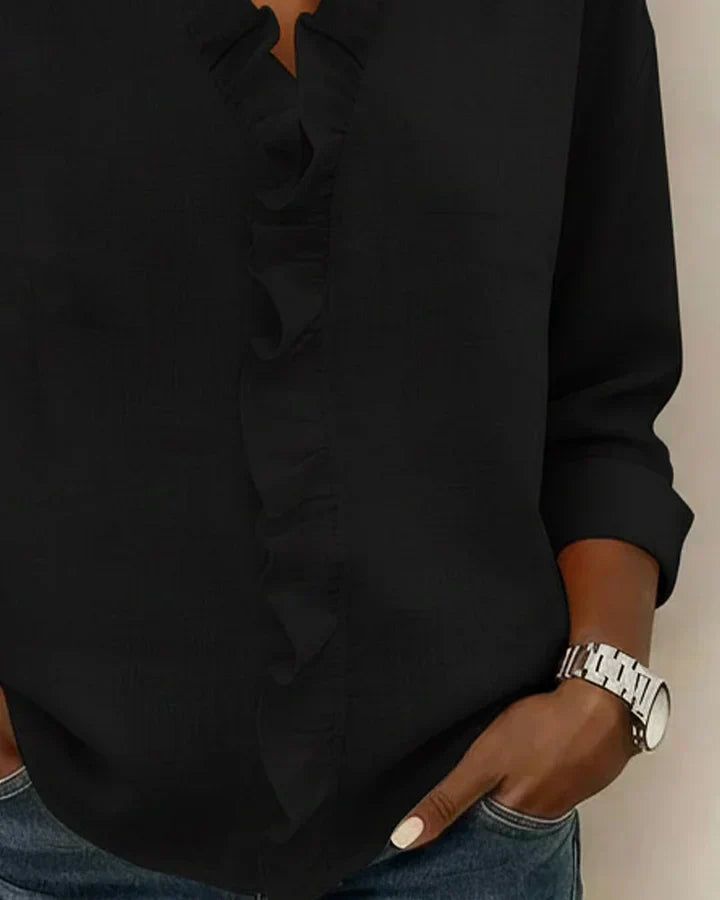 Elegant ruffled V-neck top for women, a stylish long sleeve blouse in a versatile fashion.