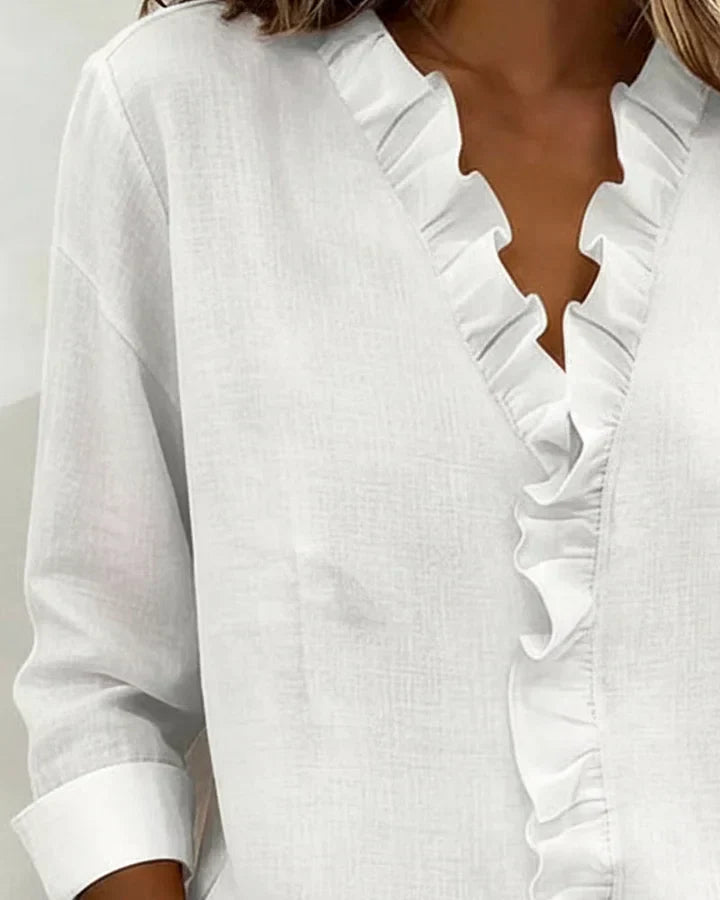 Relaxed fit women's blouse, V-neck design with beautiful ruffles, lightweight & comfortable.