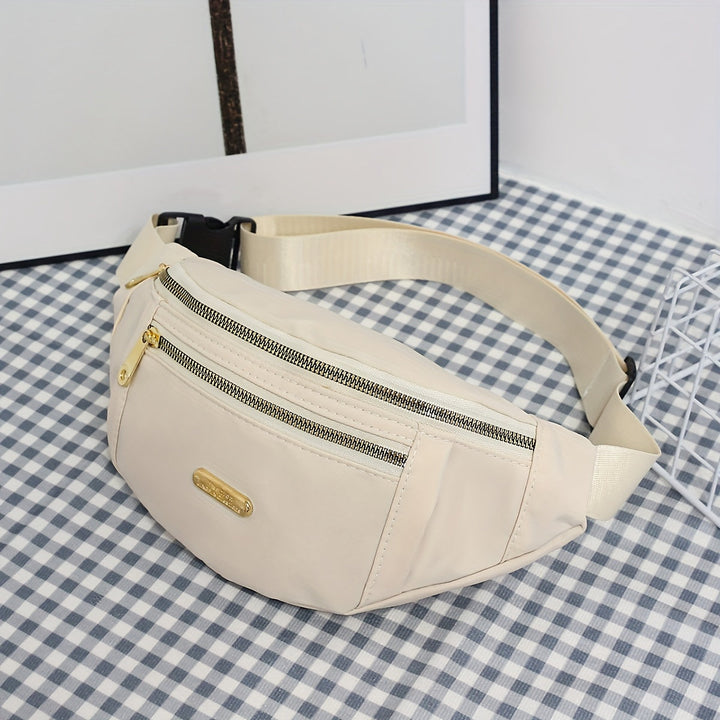 Women wearing a lightweight multi-zip waist bag, showcasing comfortable fit & style.