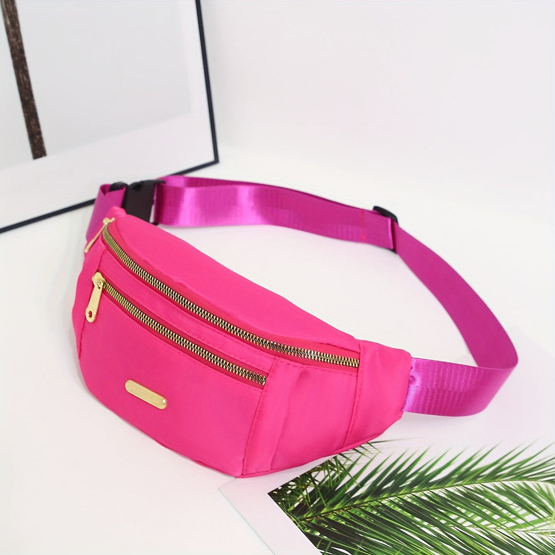 Close-up of multi-zip pockets on women's lightweight bum bag, for secure storage.