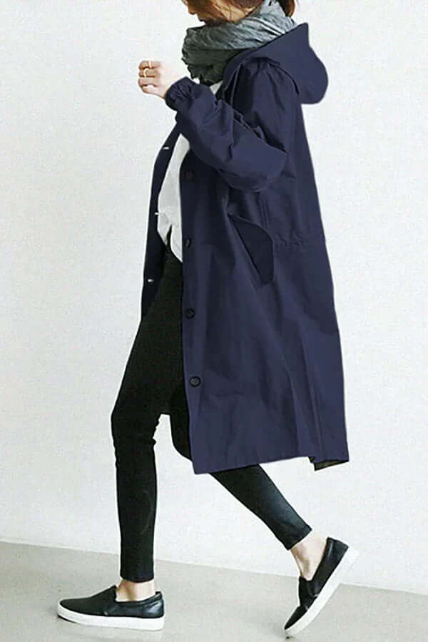 Women's lightweight waterproof rain cape, essential rain gear for stylish and breathable protection.