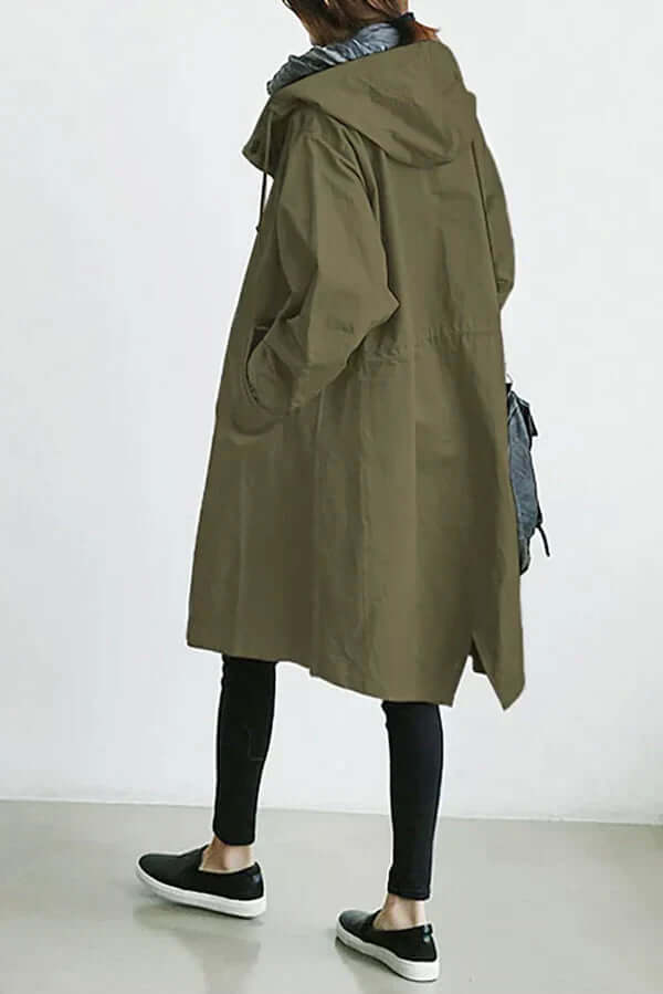 Full view of a women's lightweight waterproof rain cape, offering stylish & versatile weather protection.