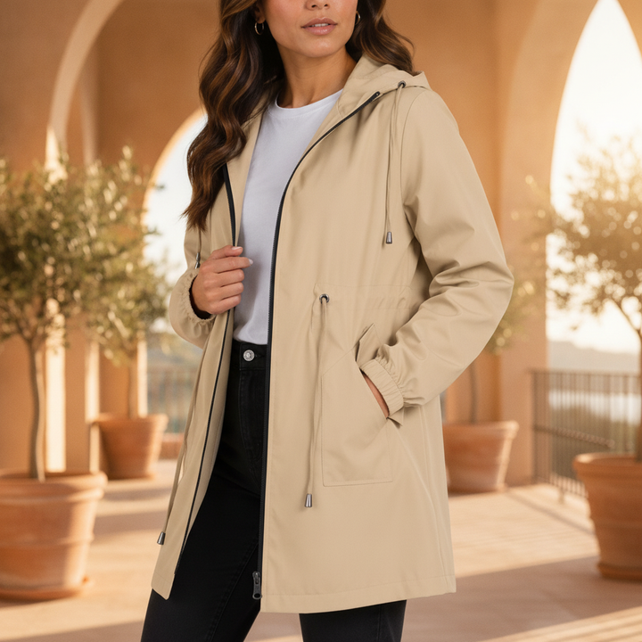 Women's lightweight waterproof raincoat with hood, perfect for all seasons.