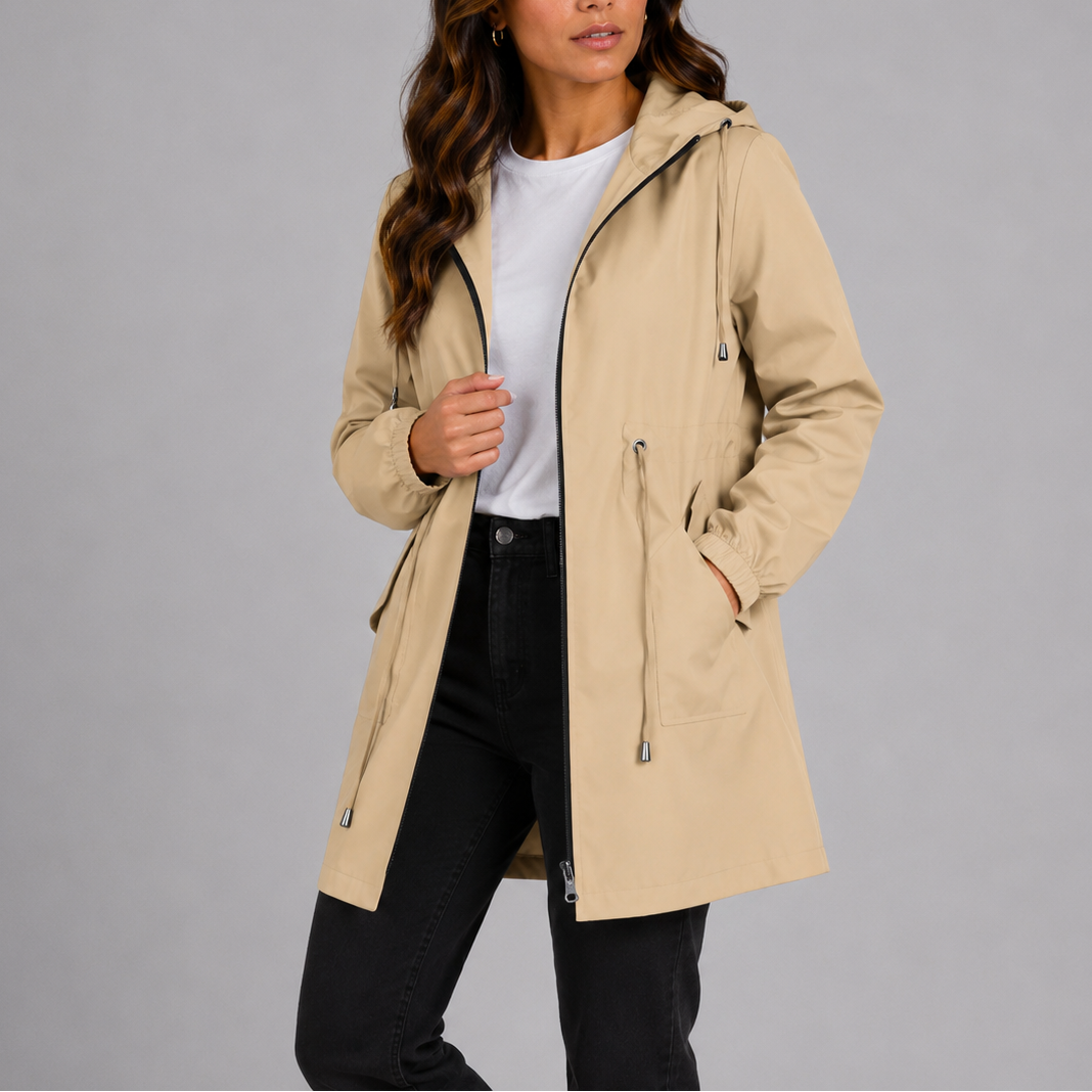 Stylish women's hooded waterproof jacket for all-weather protection & travel.