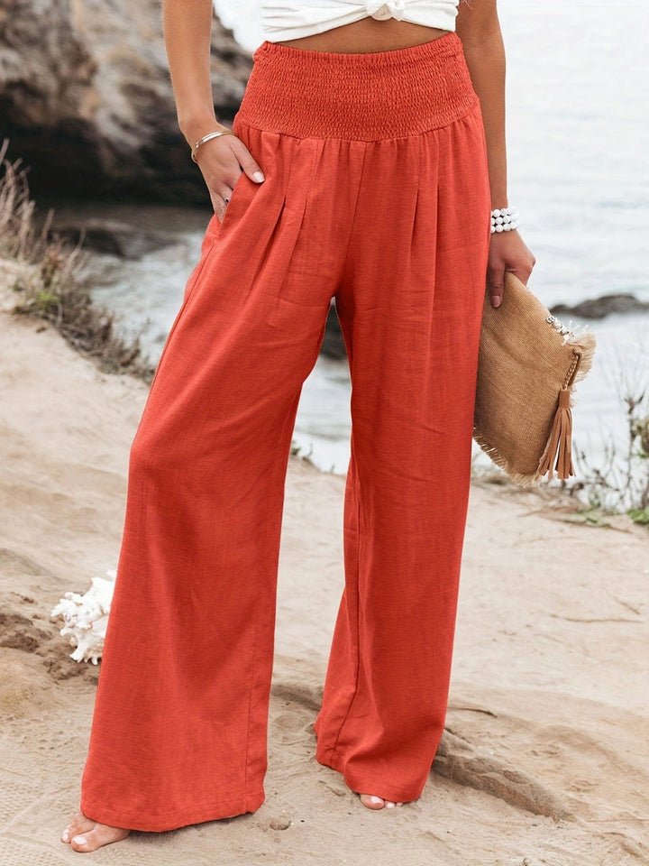 Seasonal must-have: women's lightweight wide leg linen pants for warm weather.