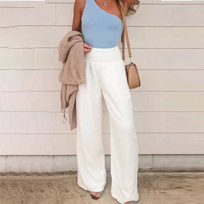 Elegant drape of women's wide leg linen trousers, ideal for versatile styling.