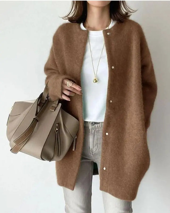 Lightweight women's cardigan in a warm beige, perfect for cozy winter fashion.