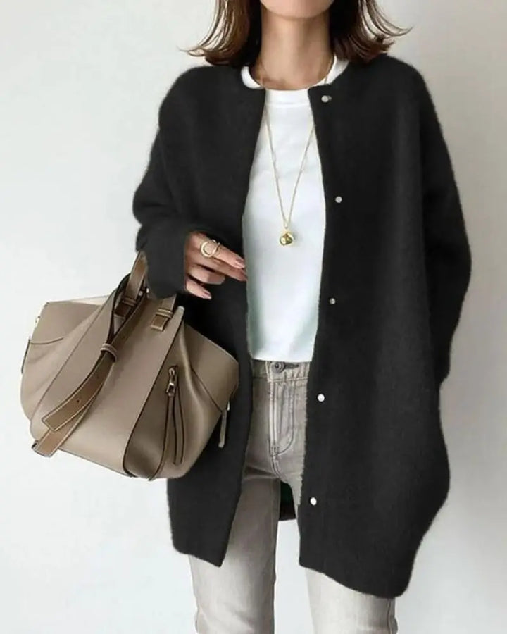 A flattering silhouette of a women's versatile wool cardigan for effortless layering.