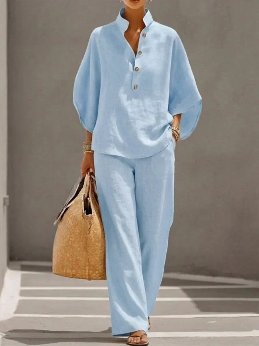 Casual chic women's two-piece set featuring a comfy linen-blend batwing top and flowy wide-leg trousers.