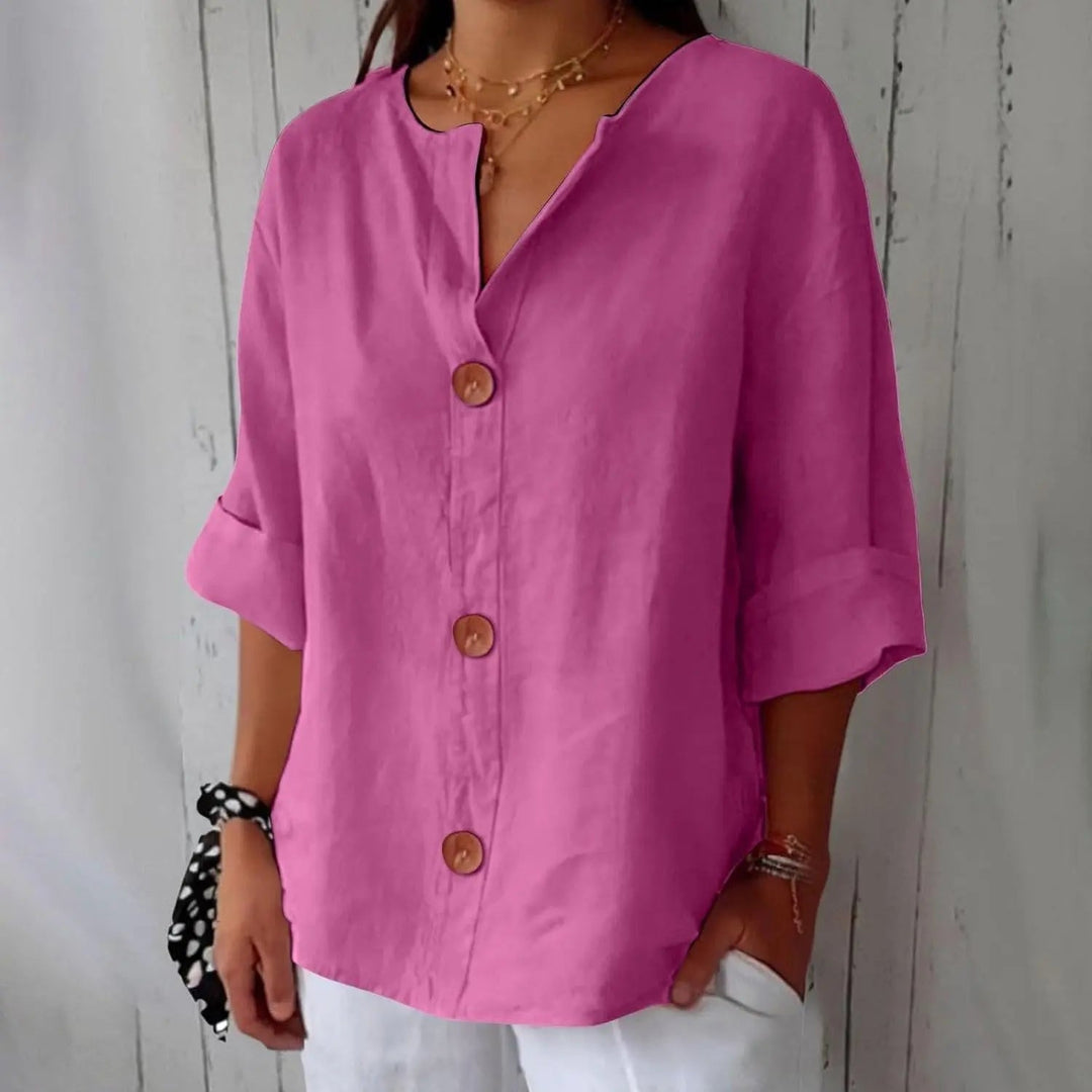Fashionable women's button front top, three quarter sleeves and relaxed fit linen for versatile everyday style.