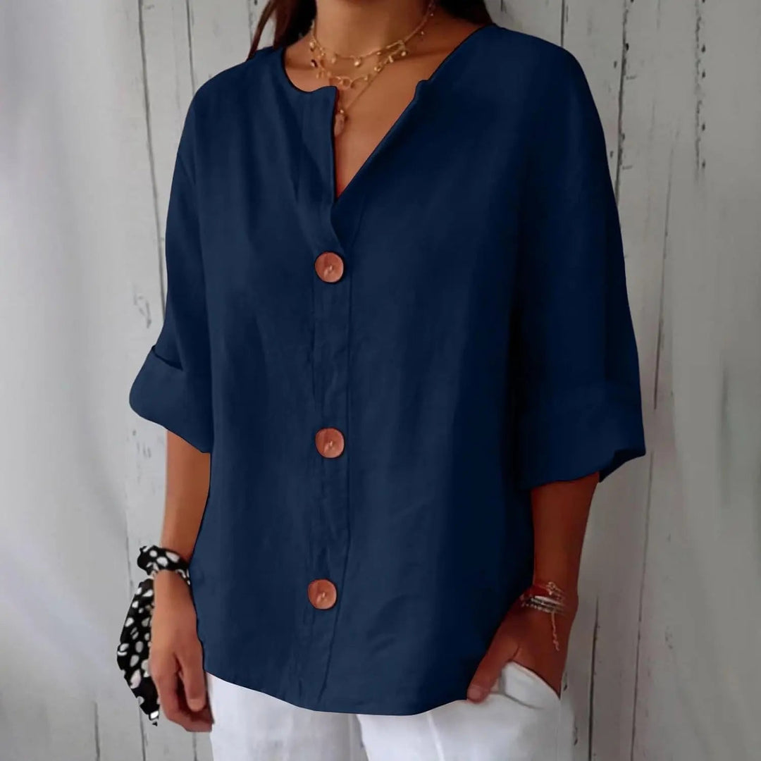 Everyday women's linen button front blouse, designed with three quarter sleeves for effortless casual elegance.