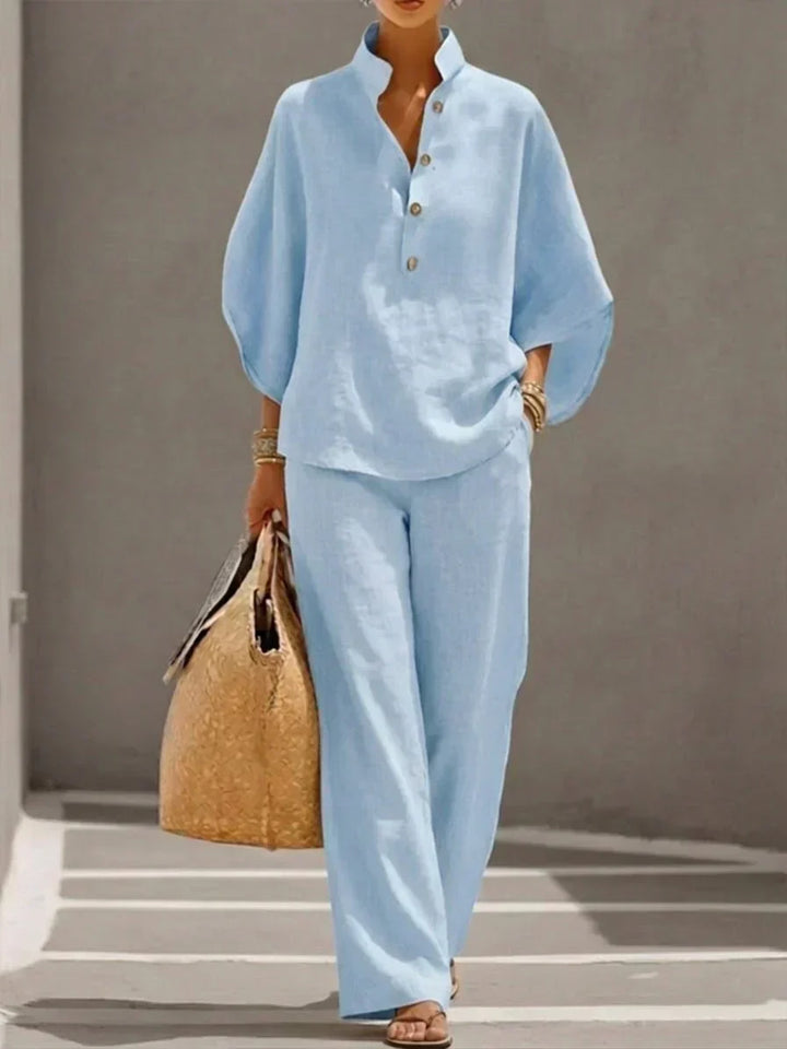 Casual women's linen set: batwing sleeve top & wide-leg pants. Breathable spring/summer fashion.