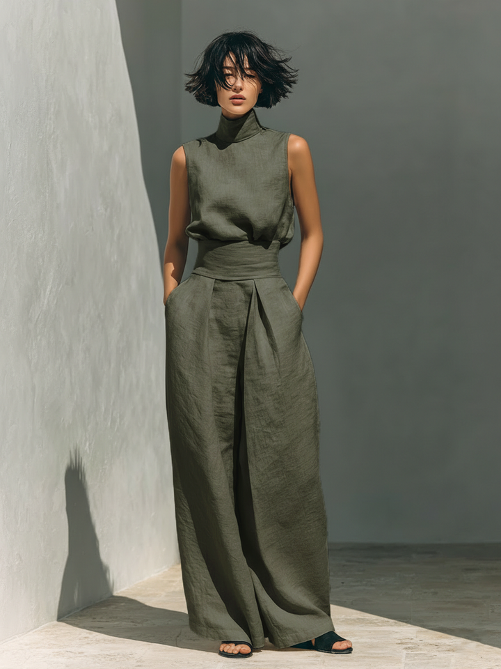 Stylish women's linen set: sleeveless roll neck top and breathable wide-leg pants. Summer casual.