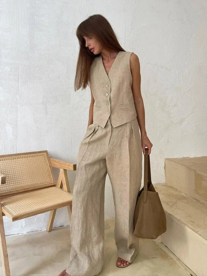 Women's linen V-neck vest & wide-leg trouser two-piece set for breathable summer fashion.