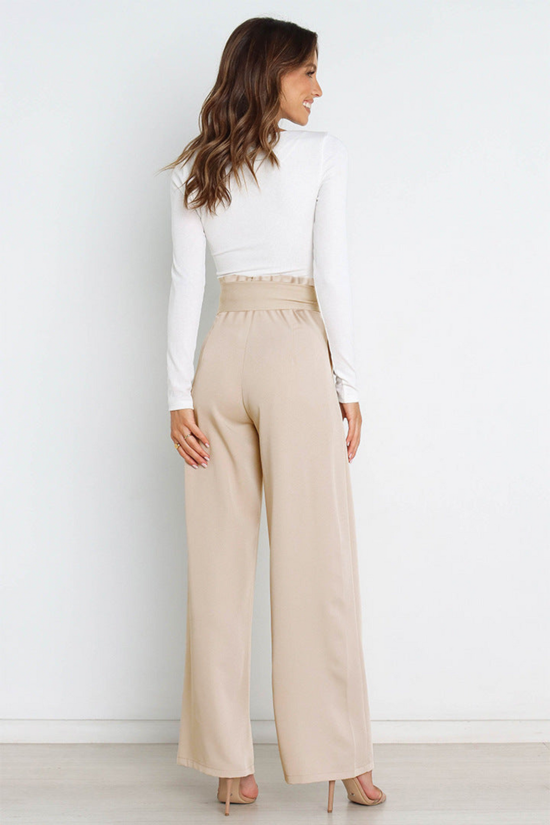 Stylish women's linen wide leg pants, high-waisted with a flattering tie.