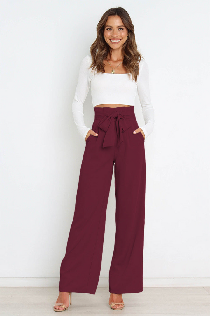 Chic women's wide leg linen pants, featuring a stylish adjustable tie waist.