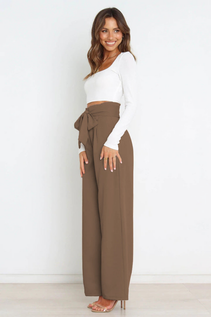 Versatile women's linen wide leg trousers, comfortable for work or leisure.