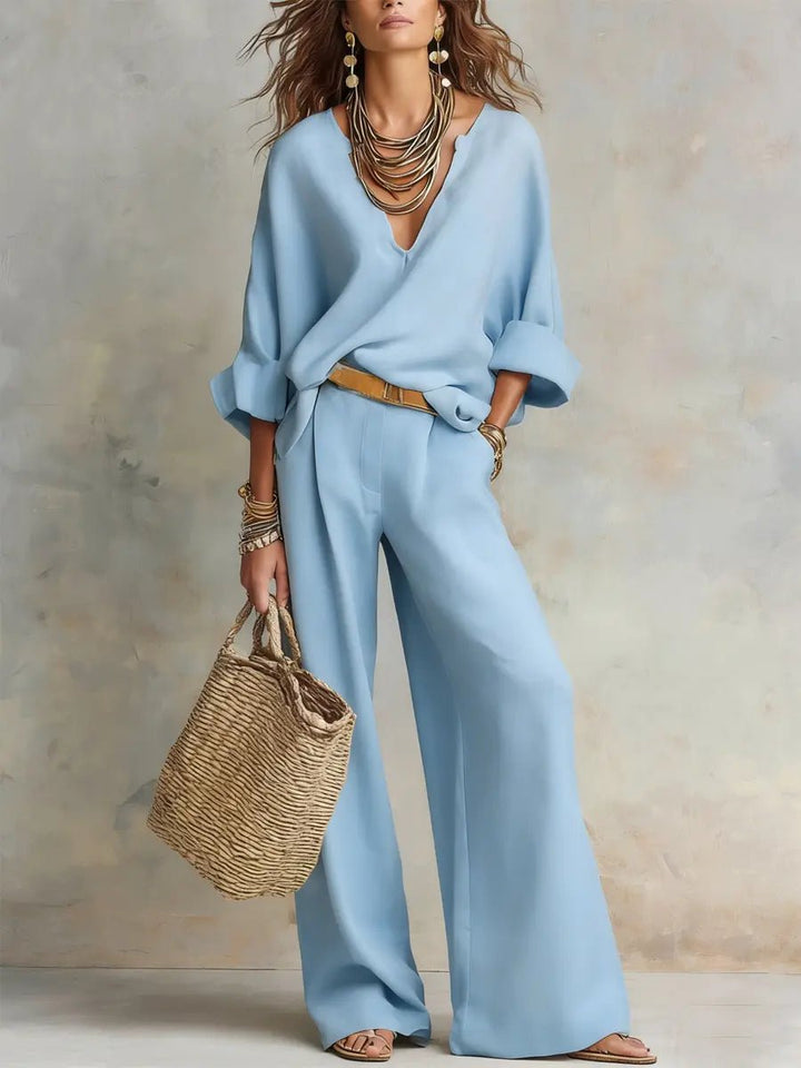 Chic women's casual linen set with wide leg pants & V-neck top, ideal for warm weather.